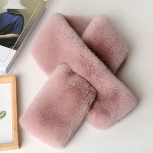 Pink faux rabbit fur scarf with cross-wrap design for winter warmth and soft texture