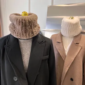 Detail showing thick faux rabbit fur neck warmers in brown and beige colors