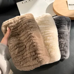 Plush faux rabbit fur neck warmer in brown, beige, and grey with soft pleated texture