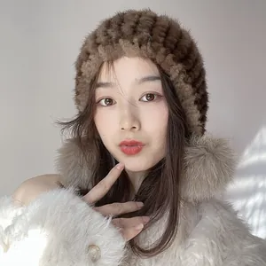 Close-up of a dark brown mink fur hat featuring fluffy texture and luxury glossy finish