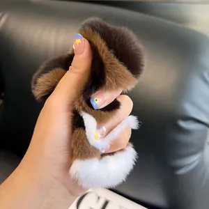 Plush faux rabbit fur pom pom charm in tri-color brown black and white for bags