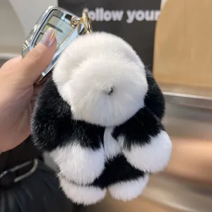 Porte-clés mignon lapin en peluche noir et blanc avec fourrure de lapin et fermoir doré