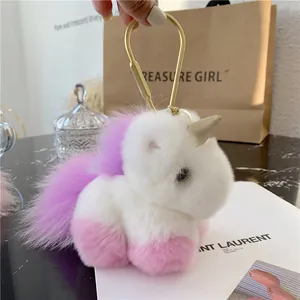 Cute unicorn plush keychain with white faux fur and golden metal ring for bags