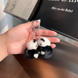 Paire de porte-clés panda mignons en fourrure de vison véritable avec anneaux en métal