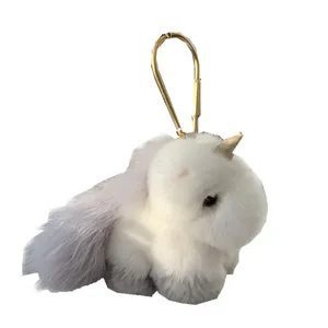 Plush unicorn horse keychain with soft white fur and golden metal hook for bags