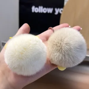 Cute fluffy rabbit fur ball keychain pendant for car keys and bags in soft cream and khaki