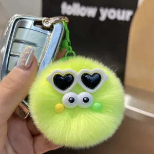 Neon green plush fluffy ball keychain with heart sunglasses and big eyes hanging charm