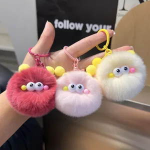 Plush faux rabbit fur ball keychains with big eyes in red, pink and beige colors
