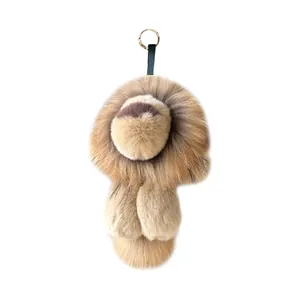 Bijou de sac lion en peluche marron avec crinière et boucle dorée de marque