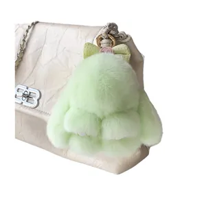 Porte-clés lapin en fourrure vert clair avec nœud et fermoir doré pour sacs à main