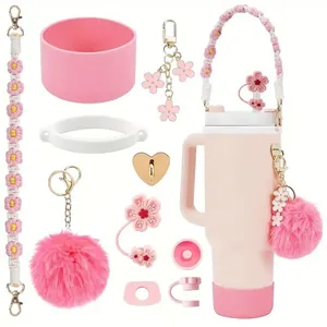 Detailed accessory set for tumbler with floral strap, fur ball, and silicone boot charms