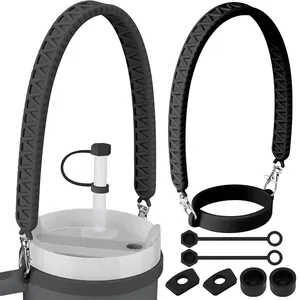 Detail view of black silicone accessory set including carry handle and leak-proof stoppers