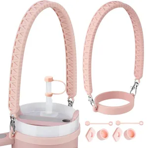 Pink silicone accessory set for tumblers including handle, straw cover and leak stoppers