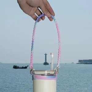Pink and blue gradient silicone cup carrier strap with wavy texture and gold metal clasp
