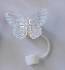 Detailed view of iridescent laser butterfly straw topper for Stanley cups with silicone ring