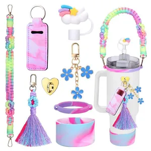 Colorful Stanley cup accessories set with rainbow rope, silicone boot, and charms