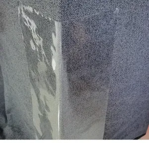 L-shaped transparent PVC anti-scratch protector for gray fabric furniture corners
