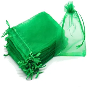 Vibrant green organza drawstring mesh bag for garden fruit protection and plant storage