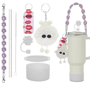 Accessoires Stanley Cup : poignée fleurie mauve, couvre-paille et base pailletée