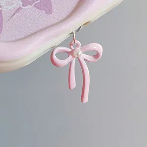 Pendentif nœud rose avec perle pour bouchon anti-poussière de port de charge mobile