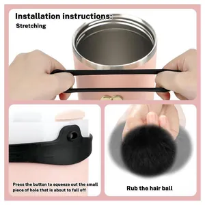 Detail showing elastic strap installation and pink faux fur ball charm on the cup
