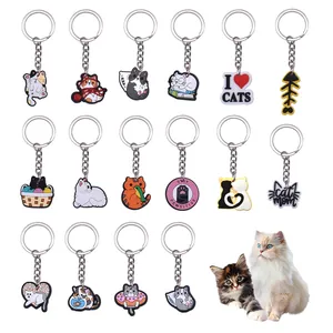 Set dettagliato di 16 portachiavi a forma di gatto in PVC con vari ciondoli e anelli