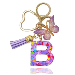 Portachiavi con Lettere dell'Alfabeto in Resina Viola Con Ciondolo a Farfalla Nappa Cuore Glitter Paillettes Portachiavi a Cuore Oro per Donna Gioielli Borsa