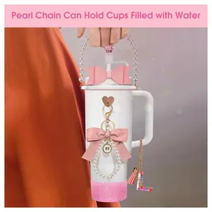 Pink Stanley cup accessory set with pearl chain, leather bow and glitter boot cover