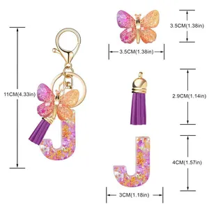 Porte-clés lettre J en résine violette avec pendentif papillon et pompon avec dimensions