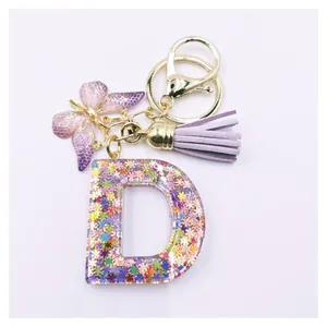 Letter D resin keychain with colorful sequins purple tassel and butterfly pendant decoration