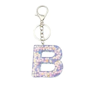 Porte-clés lettre B en résine violette scintillante avec paillettes et anneau argenté
