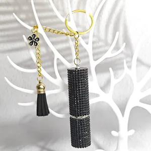 Luxury black rhinestone perfume bottle keychain with golden hardware and tassel charm