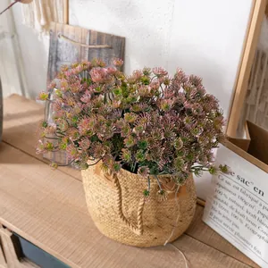 Faux artificial plants in woven basket for Nordic style home interior decoration