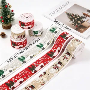 Close-up of rustic Christmas burlap ribbons featuring vintage trucks and snowman patterns