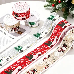 Detailed close-up of Merry Christmas ribbons with vintage truck and snowman patterns