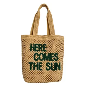 Large straw tote bag with Here Comes The Sun embroidery for beach or commute