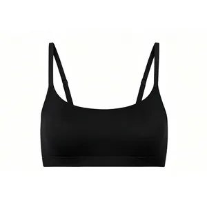 Close-up of black seamless U-neck sports bra with adjustable straps and wide support band