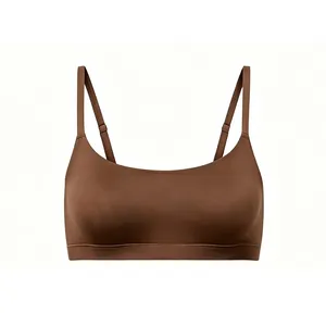 Detail of coffee brown seamless bra with adjustable straps and wide elastic underband