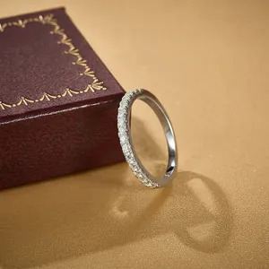 S925 sterling silver half-eternity moissanite ring displayed in a vintage jewelry box