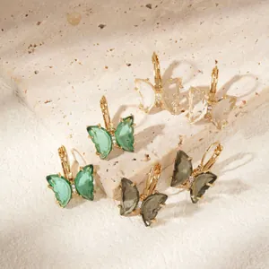 Elegant butterfly stud earrings with crystal wings and gold-plated alloy clasps