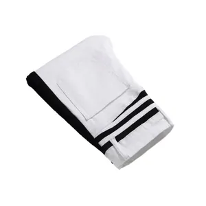 Slim fit black and white patchwork denim jeans with triple side stripes on the leg
