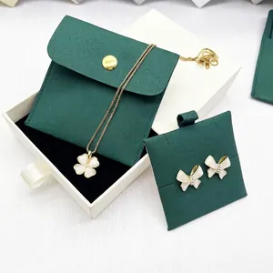 Microfiber jewelry set packaging with dark green velvet pouch and gift box setup