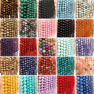 Various natural stone beads including tiger eye and obsidian for DIY jewelry making