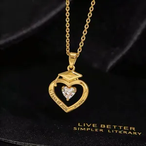 Detail of 2026 graduation heart necklace with gold plating and cubic zirconia stone