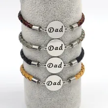 Detail of multi-color 4mm braided leather bracelets with engraved Dad metal plates