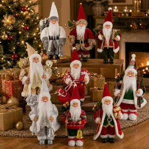 Standing Santa Claus figurines with gift bags and accessories for Christmas decor