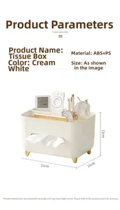 Detailed view of cream-colored tissue box with gold stand and multi-functional storage top