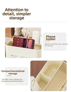 Close-up of cream multifunctional tissue box with built-in phone stand and dual storage slots