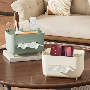 Modern cream-style tissue box and desktop organizer with golden feet in home setting