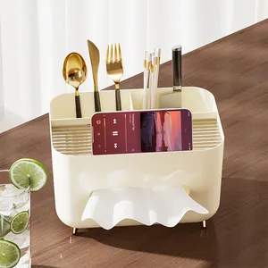Cream-colored desktop organizer tissue box with phone stand on dark wooden table